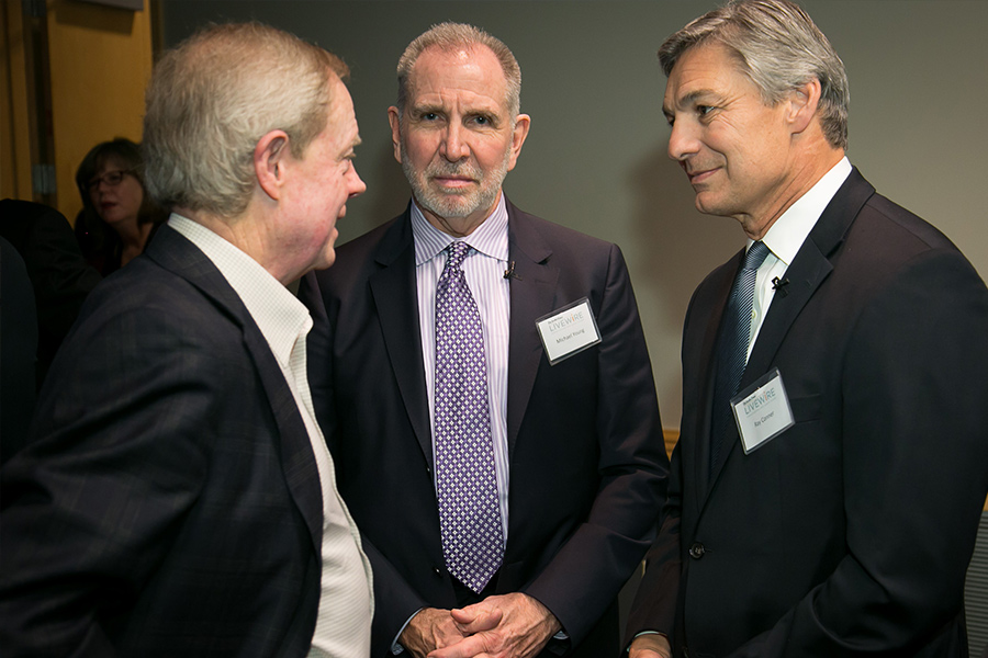 Seattle Times Publisher Frank Blethen (left) speaks with panelists Ray Conner (right), Boeing Commercial Airplanes president and CEO, and Michael Young, president of the University of Washington.