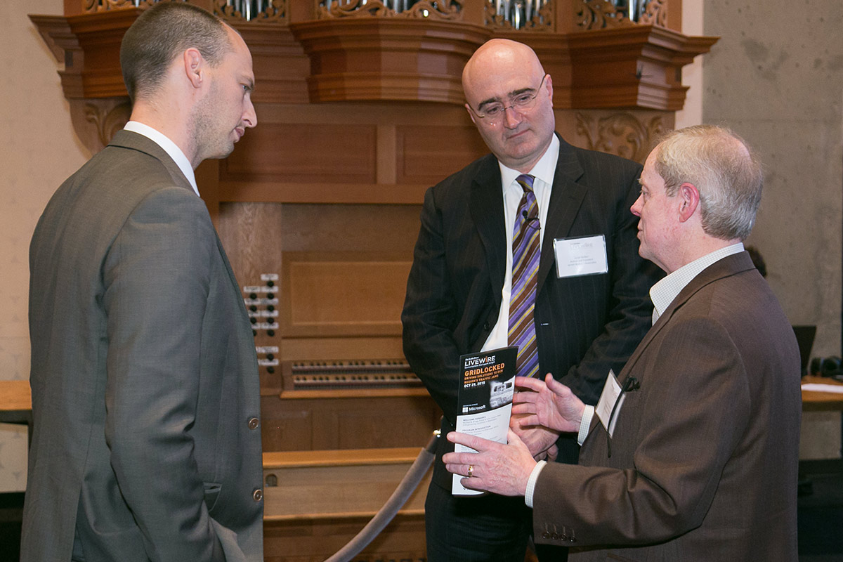 Seattle Times Publisher Frank Blethen talks with panelists Scott Kubly and Jarrett Walker at a pre-event reception.